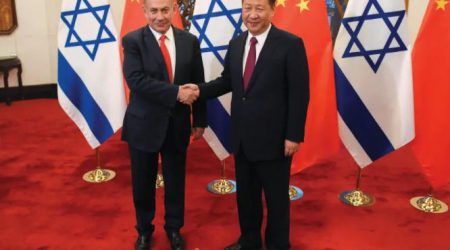 CHINESE PRESIDENT Xi Jinping and Prime Minister Benjamin Netanyahu shake hands in Beijing in 2017. Navon’s book addresses Israel’s complex relations in Asia and elsewhere (credit: ETIENNE OLIVEAU/POOL/REUTERS)